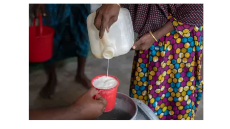 Bangladesh_Milk pouring into red cup