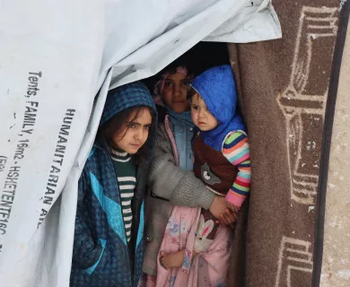 Syrian children inside tent