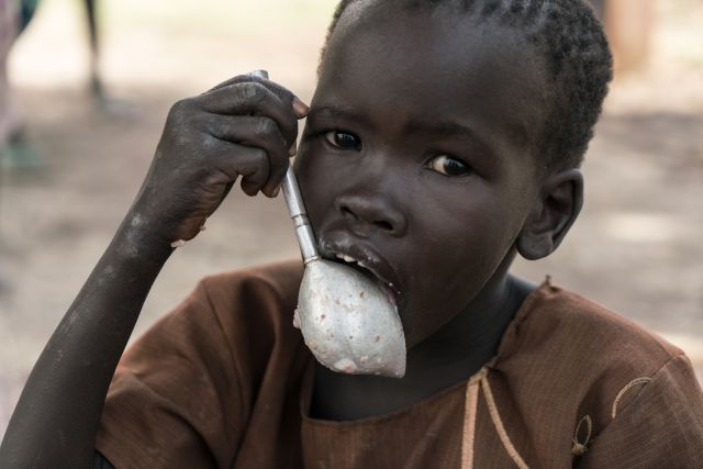After over two years of fighting, one of the biggest challenges now facing South Sudan is lack of food with one in three people not having enough to eat. For Nyahok's family this means that instead of eating three times a day, they now only eat once or twice. Photo: Lucy Beck/CARE.