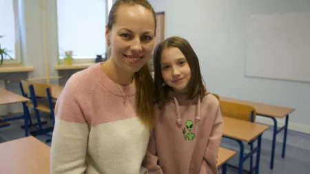 Daria and a girl in school in Poland