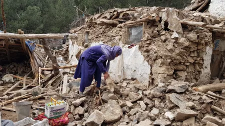 Man in area destroyed by Earthquake in Afghanistan