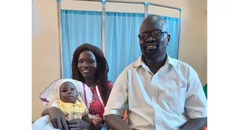 South Sudanese woman Rebecca, her husband and baby