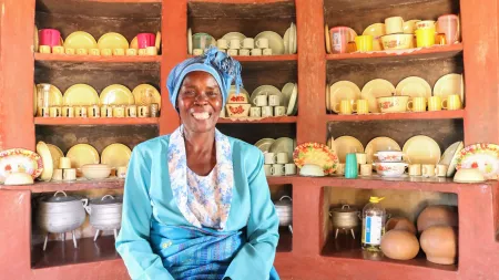 Sister Hlongwani in front of cupboard in Zimbabwe