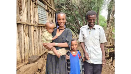 Ethiopian couple standing with their two children