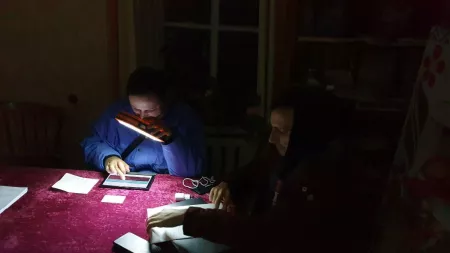 Ukraine_People using torches in the dark