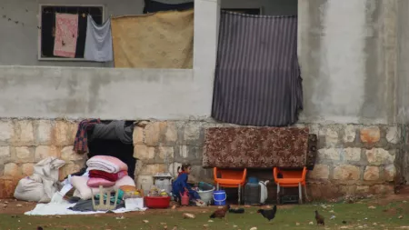 Syria_Building with squatters furniture outside