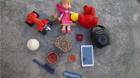 Syaria_Toys a brush a speaker and tablet retrieved after earthquakes