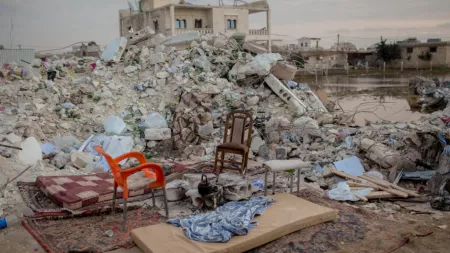 Syria_Furniture placed outside rubble of destroyed building