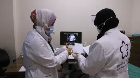 Syria_Women gynaecologists examining ultrasound together