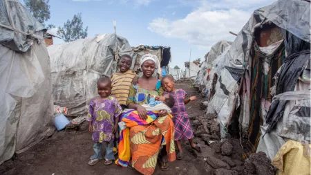 DRC_Woman with her children in makeshift tent camp