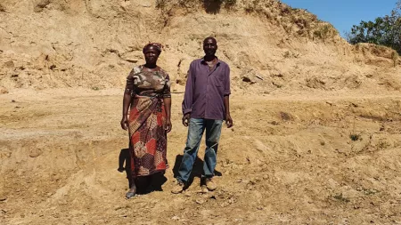 Zambia_Couple standing in dried up dam area
