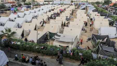Tents lined up in a camp