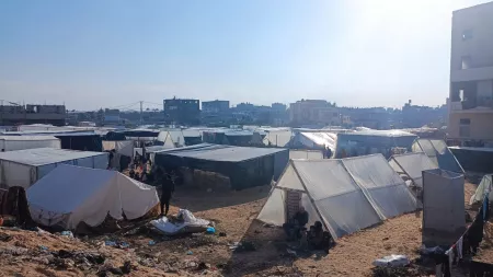 Tents in a camp in a day with blue skies and bright sun