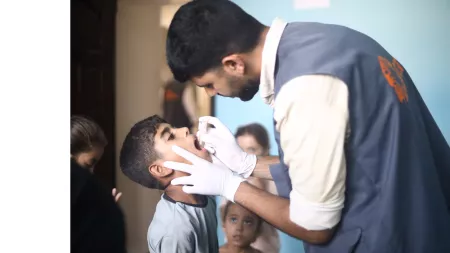 Aid Worker, Children, kid, vaccine, Gaza, Medical clinic, CARE Staff