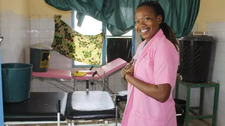 Neloumta, a midwife in Chad, gets ready for work at a health center near the border of Sudan.