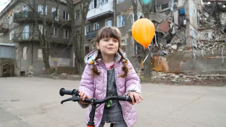 Little girl on a bike