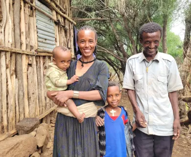 Ethiopian couple standing with their two children