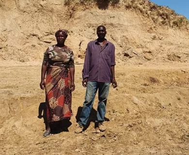 Zambia_Couple standing in dried up dam area