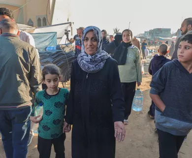 Woman and children walking
