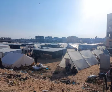 Tents in a camp in a day with blue skies and bright sun